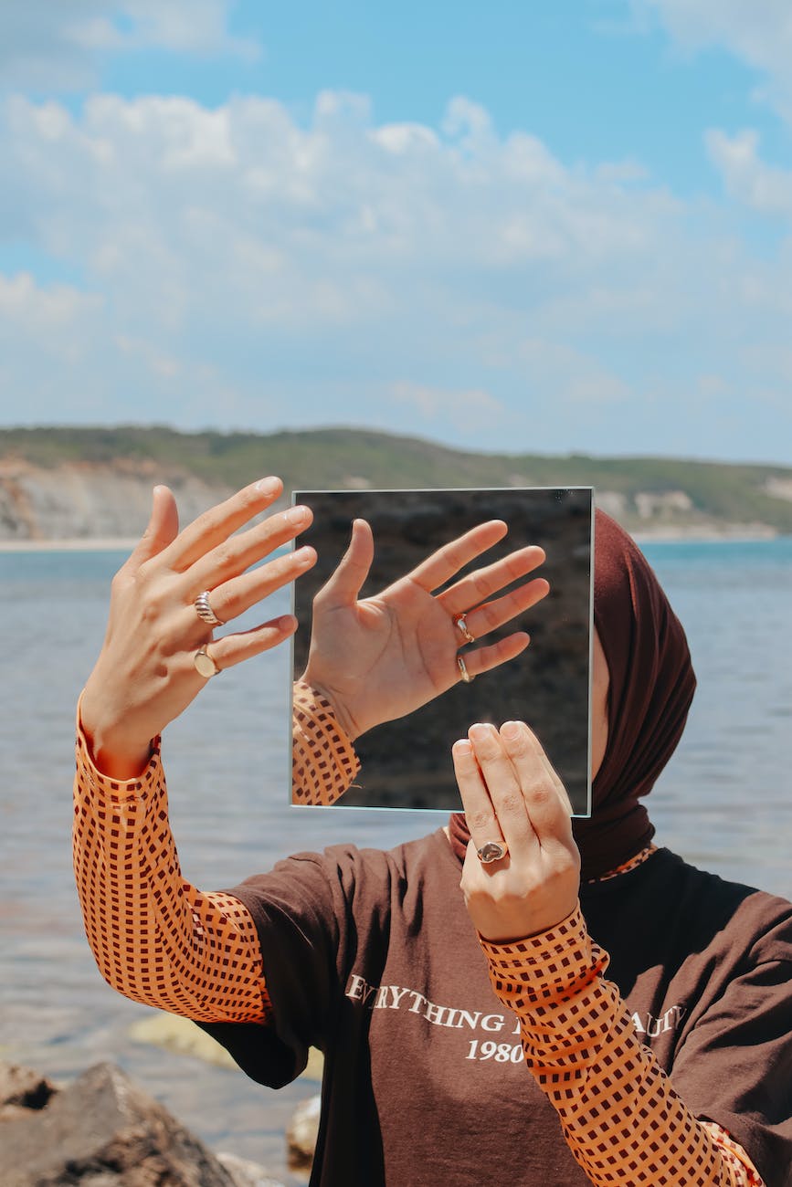 woman holding a mirror